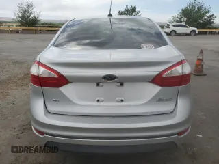 2014 Ford Fiesta SE z VIN 3FADP4BJ8EM133030, wystawiony jako Copart lot #52046065 z przebiegiem 113 792 mil mil oraz Szkoda całkowita • Salvage title. Historia ofert i sprzedaży dostępna na DreamBid. Obrazek 6.