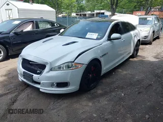 2014 Jaguar XJ with VIN SAJWA2EK8EMV67443, listed as a IAAI auction lot 42483075 with 88,357 mi miles and . Bid and sale history available at DreamBid. Image 2.