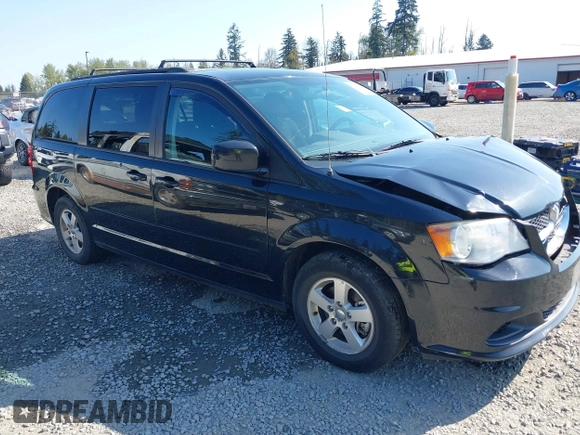 2012 Dodge Grand Caravan SXT with VIN 2C4RDGCG2CR319651, listed as a IAAI auction lot 42097594 with 155,521 mi miles and . Bid and sale history available at DreamBid. Image 1.