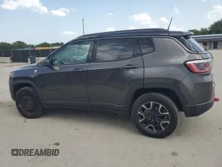 2019 Jeep Compass Trailhawk with VIN 3C4NJDDBXKT721356, listed as a Copart auction lot 60003045 with 164,864 mi miles and Clean title. Bid and sale history available at DreamBid. Image 2.