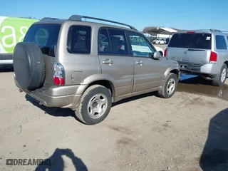 2005 Suzuki Grand Vitara LX with VIN JS3TD62V454200331, listed as a IAAI auction lot 41896812 with 122,974 mi miles. Bid and sale history available at carsss.com. Image 4.