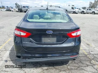 2015 Ford Fusion SE Hybrid with VIN 3FA6P0LU7FR199065, listed as a IAAI auction lot 41944181 with 197,020 mi miles. Bid and sale history available at carsss.com. Image 16.