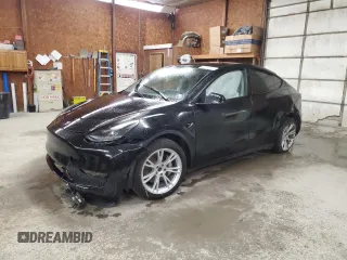2023 Tesla Model Y Long Range z VIN 7SAYGDEE7PF797887, wystawiony jako Copart lot #57130225 z przebiegiem Nie podano mil oraz Szkody całkowita. Historia ofert i sprzedaży dostępna na DreamBid. Obrazek 1.