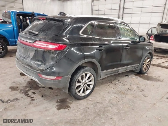 2016 Lincoln MKC Select with VIN 5LMCJ2D94GUJ11483, listed as a IAAI auction lot 41318582 with 170,660 mi miles. Bid and sale history available at carsss.com. Image 4.