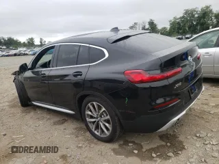 2019 BMW X4 xDrive30i with VIN 5UXUJ3C51KLG52927, listed as a Copart auction lot 65533883 with 53,056 mi miles. Bid and sale history available at carsss.com. Image 2.