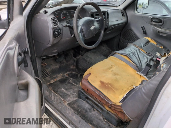 2003 Ford F-150 XL with VIN 1FTRF17W03NA02988, listed as a Copart auction lot 77209084 with Not Provided miles and Salvage Title. Bid and sale history available at DreamBid. Image 8.