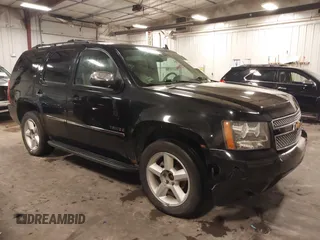 2012 Chevrolet Tahoe LTZ with VIN 1GNSKCE02CR297261, listed as a IAAI auction lot 40255137 with 283,110 mi miles and . Bid and sale history available at DreamBid. Image 14.