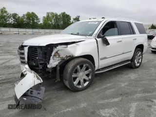 2020 Cadillac Escalade Premium Luxury z VIN 1GYS4CKJ6LR304822, wystawiony jako Copart lot #58574305 z przebiegiem 47 184 mil mil oraz Szkoda całkowita • Salvage title. Historia ofert i sprzedaży dostępna na DreamBid. Obrazek 1.