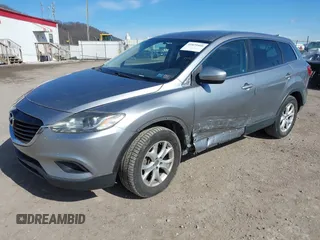 2015 Mazda CX-9 Sport with VIN JM3TB2BA6F0455539, listed as a IAAI auction lot 41839466 with 143,667 mi miles and . Bid and sale history available at carsss.com. Image 18.
