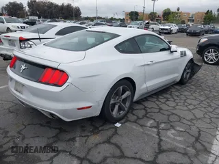 2016 Ford Mustang V6 with VIN 1FA6P8AM2G5292940, listed as a IAAI auction lot 41530716 with 96,876 mi miles and . Bid and sale history available at carsss.com. Image 4.