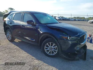 2023 Mazda CX-5 2.5 S Select Package with VIN JM3KFBBM1P0284887, listed as a IAAI auction lot 41910092 with 2,616 mi miles. Bid and sale history available at carsss.com. Image 1.