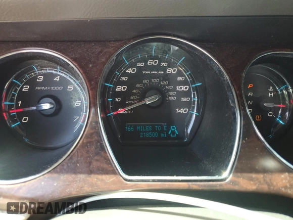 2010 Ford Taurus Limited z VIN 1FAHP2FW5AG148875, wystawiony jako Copart lot #59106595 z przebiegiem 218 500 mil mil oraz Szkoda całkowita • Salvage title. Historia ofert i sprzedaży dostępna na DreamBid. Obrazek 9.