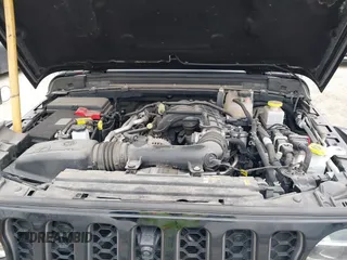 2022 Jeep Gladiator Rubicon with VIN 1C6JJTBG7NL145501, listed as a IAAI auction lot 41506842 with 20,593 mi miles and . Bid and sale history available at DreamBid. Image 10.