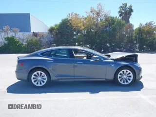 2014 Tesla Model S 60 z VIN 5YJSA1H17EFP33910, wystawiony jako IAAI lot #42346934 z przebiegiem Nie podano mil oraz . Historia ofert i sprzedaży dostępna na DreamBid. Obrazek 13.