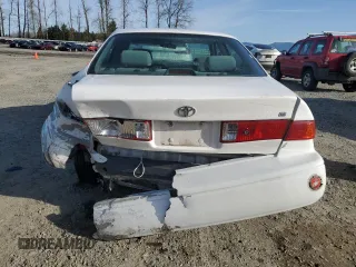 2000 Toyota Camry CE with VIN JT2BG22K0Y0470743, listed as a Copart auction lot 51980385 with 300,464 mi miles and Salvage Title. Bid and sale history available at carsss.com. Image 6.