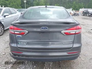 2019 Ford Fusion Titanium with VIN 3FA6P0SU9KR126985, listed as a IAAI auction lot 42255509 with 138,779 mi miles and . Bid and sale history available at DreamBid. Image 16.