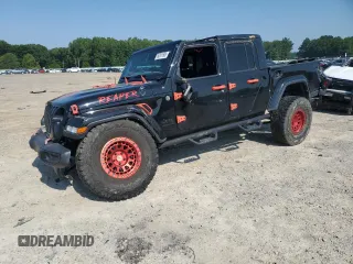 2022 Jeep Gladiator Texas Trail с VIN 1C6HJTAG9NL125170, выставлен на аукционе Copart как лот 60201505 с пробегом 66 881 миль миль и Списание • Salvage title. История ставок и продаж доступна на DreamBid. Изображение 1.