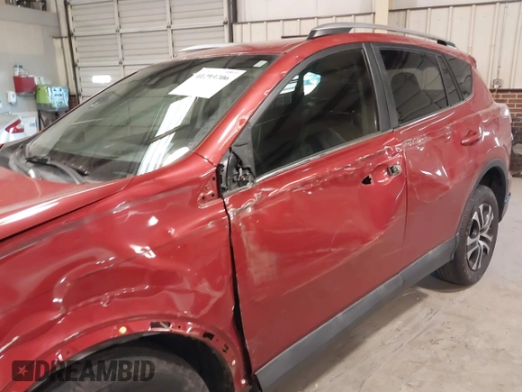 2017 Toyota RAV4 LE with VIN 2T3ZFREV5HW320310, listed as a IAAI auction lot 41293706 with 53,738 mi miles and . Bid and sale history available at carsss.com. Image 18.