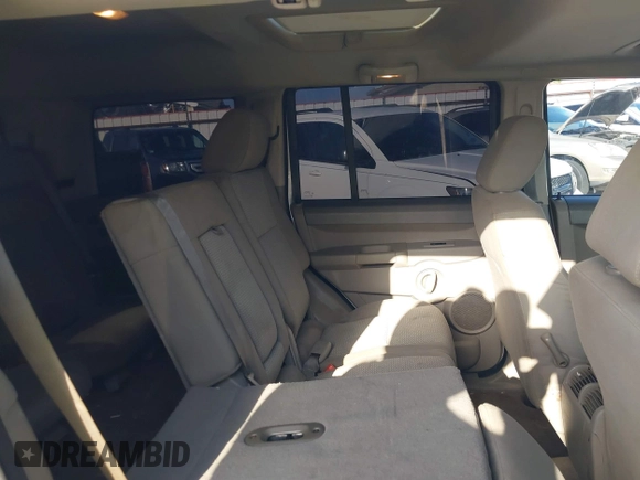 2007 Jeep Commander Sport z VIN 1J8HH48K47C699904, wystawiony jako IAAI lot #42509665 z przebiegiem 198 539 mil mil oraz . Historia ofert i sprzedaży dostępna na DreamBid. Obrazek 8.