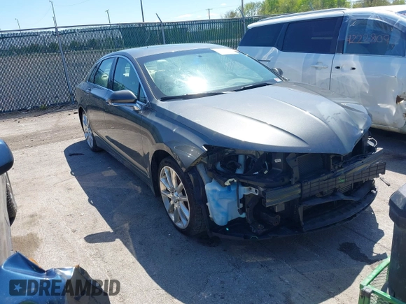 2015 Lincoln MKZ z VIN 3LN6L2G93FR607192, wystawiony jako IAAI lot #42226377 z przebiegiem 74 018 mil mil oraz . Historia ofert i sprzedaży dostępna na DreamBid. Obrazek 1.