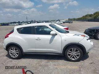2013 Nissan Juke S with VIN JN8AF5MR2DT205370, listed as a IAAI auction lot 42055335 with 115,390 mi miles. Bid and sale history available at carsss.com. Image 13.
