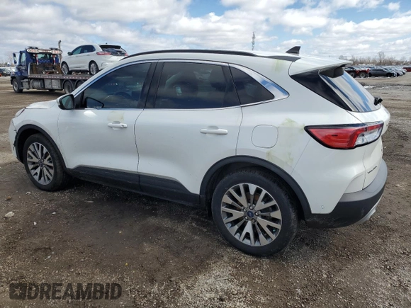 2021 Ford Escape Titanium Hybrid с VIN 1FMCU9DZ5MUA23637, выставлен на аукционе Copart как лот 51991185 с пробегом 101 012 миль миль и Чистый • Clean title. История ставок и продаж доступна на DreamBid. Изображение 2.