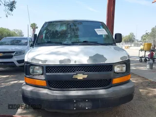 2012 Chevrolet Express Cargo with VIN 1GCSGAFXXC1182349, listed as a IAAI auction lot 42402644 with 204,411 mi miles and . Bid and sale history available at DreamBid. Image 12.