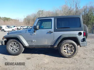 2016 Jeep Wrangler Rubicon z VIN 1C4BJWCGXGL307542, wystawiony jako IAAI lot #41407411 z przebiegiem 124 749 mil mil oraz . Historia ofert i sprzedaży dostępna na DreamBid. Obrazek 14.