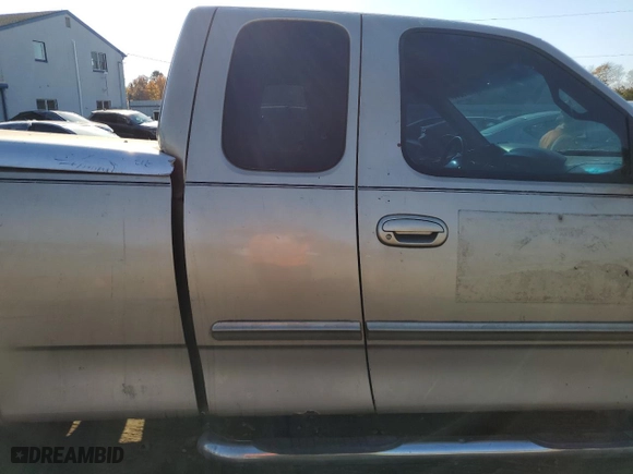 1999 Ford F-150 Work Series with VIN 1FTRX18WXXNA56977, listed as a Copart auction lot 77179044 with 0 mi miles and Salvage Title. Bid and sale history available at carsss.com. Image 10.
