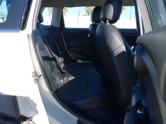 2018 MINI Hardtop 4 Door Cooper with VIN WMWXU1C58J2F80703, listed as a IAAI auction lot 41655964 with 65760 miles. Bid and sale history available at carsss.com. Image 8.