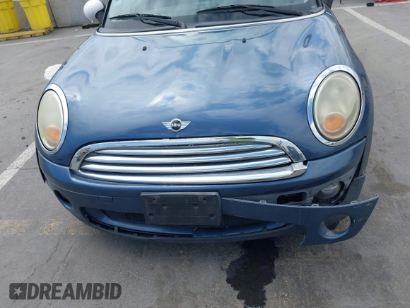 2009 MINI Hardtop z VIN WMWMF33569TW77166, wystawiony jako IAAI lot #42120132 z przebiegiem 150 291 mil mil oraz . Historia ofert i sprzedaży dostępna na DreamBid. Obrazek 12.