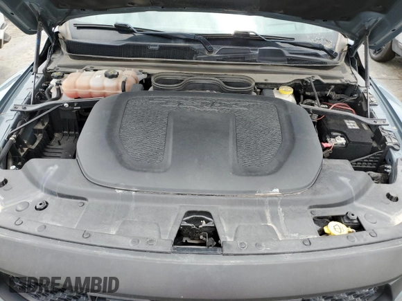 2021 Ram 1500 with VIN 0K1905786880, listed as a Copart auction lot 61756114 with 34,927 mi miles and Clean title. Bid and sale history available at DreamBid. Image 11.