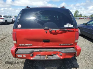 2000 Chevrolet Blazer LT z VIN 1GNDT13W8Y2392666, wystawiony jako Copart lot #56652895 z przebiegiem 223 924 mil mil oraz Szkoda całkowita • Salvage title. Historia ofert i sprzedaży dostępna na DreamBid. Obrazek 6.