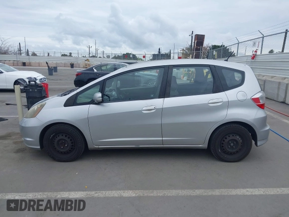2013 Honda Fit with VIN JHMGE8H38DC002109, listed as a IAAI auction lot 42067257 with 305,739 mi miles. Bid and sale history available at carsss.com. Image 14.