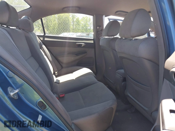 2006 Honda Civic LX with VIN JHMFA16586S000128, listed as a IAAI auction lot 42138350 with 127,253 mi miles and . Bid and sale history available at DreamBid. Image 8.