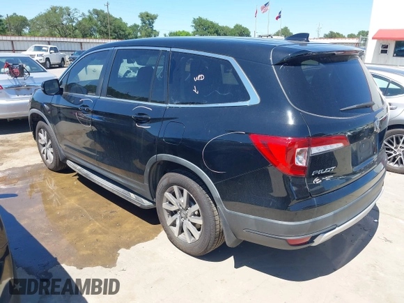 2019 Honda Pilot EX-L with VIN 5FNYF5H56KB042918, listed as a IAAI auction lot 42040516 with 113,433 mi miles and . Bid and sale history available at DreamBid. Image 3.