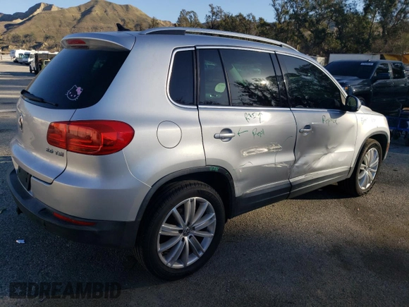 2012 Volkswagen Tiguan LE with VIN WVGAV7AX2CW580035, listed as a Copart auction lot 47297205 with 118,211 mi miles and Salvage title. Bid and sale history available at DreamBid. Image 3.