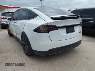 2024 Tesla Model X Plaid with VIN 7SAXCBE63RF440245, listed as a IAAI auction lot 42140051 with Not Provided miles and . Bid and sale history available at carsss.com. Image 3.