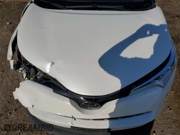 2019 Toyota C-HR XLE z VIN JTNKHMBX4K1061895, wystawiony jako Copart lot #49095605 z przebiegiem 109 974 mil mil oraz Szkoda całkowita • Salvage title. Historia ofert i sprzedaży dostępna na DreamBid. Obrazek 12.