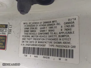 2014 Honda Civic Coupe LX with VIN 2HGFG3B56EH504587, listed as a IAAI auction lot 41569539 with 168,952 mi miles. Bid and sale history available at carsss.com. Image 9.