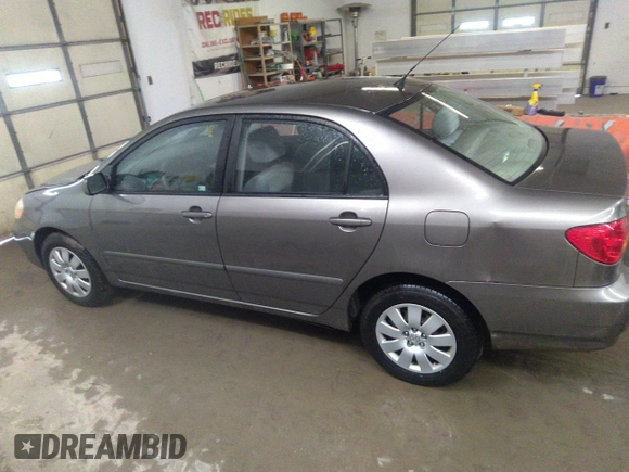 2004 Toyota Corolla CE with VIN 1NXBR32E14Z204650, listed as a IAAI auction lot 41710452 with 168,099 mi miles. Bid and sale history available at carsss.com. Image 14.