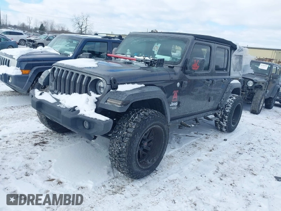 2018 Jeep Wrangler Unlimited Sport S z VIN 1C4HJXDG4JW228078, wystawiony jako IAAI lot #41381520 z przebiegiem 58 899 mil mil oraz . Historia ofert i sprzedaży dostępna na DreamBid. Obrazek 2.