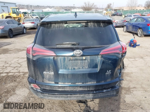 2018 Toyota RAV4 LE with VIN JTMBFREV5JD253342, listed as a IAAI auction lot 41656581 with 243,791 mi miles and . Bid and sale history available at DreamBid. Image 17.