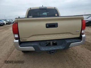 2018 Toyota Tacoma SR with VIN 3TMCZ5AN8JM145862, listed as a Copart auction lot 60190215 with 81,909 mi miles and Salvage title. Bid and sale history available at DreamBid. Image 6.