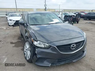 2017 Mazda 6 Touring with VIN JM1GL1V57H1127804, listed as a IAAI auction lot 41515342 with 107,336 mi miles. Bid and sale history available at carsss.com. Image 1.