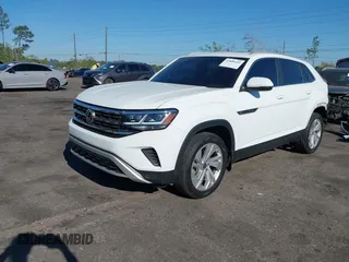2021 Volkswagen Atlas SEL z VIN 1V2EE2CA2MC227667, wystawiony jako IAAI lot #41886405 z przebiegiem 41 928 mil mil oraz . Historia ofert i sprzedaży dostępna na DreamBid. Obrazek 2.