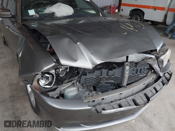 2011 Dodge Charger Rallye with VIN 2B3CL3CGXBH607876, listed as a IAAI auction lot 41778597 with 125,680 mi miles. Bid and sale history available at carsss.com. Image 6.