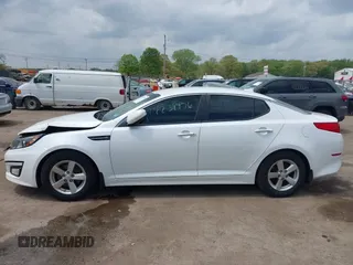 2015 Kia Optima LX z VIN KNAGM4A70F5649084, wystawiony jako IAAI lot #42231976 z przebiegiem 152 545 mil mil oraz . Historia ofert i sprzedaży dostępna na DreamBid. Obrazek 14.
