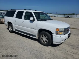 2003 GMC Yukon XL Denali with VIN 1GKFK66U63J265154, listed as a Copart auction lot 52967605 with 276,733 mi miles and Salvage Title. Bid and sale history available at carsss.com. Image 4.
