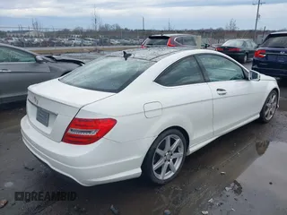 2015 Mercedes-Benz C-Class C 250 with VIN WDDGJ4HB6FG401261, listed as a IAAI auction lot 41483848 with 124,915 mi miles. Bid and sale history available at carsss.com. Image 4.